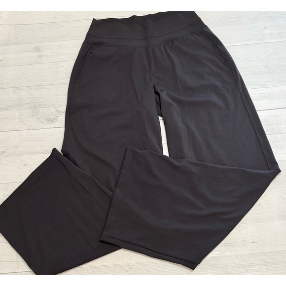 Athleta Pants - Athleta women's black wide leg pants pull on zippered pockets size medium